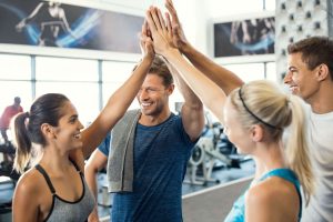 Gym partners are doing high five